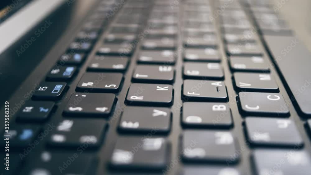 Close-up keyboard with Russian and English layout. Close-up keyboard with Russian and English layout.