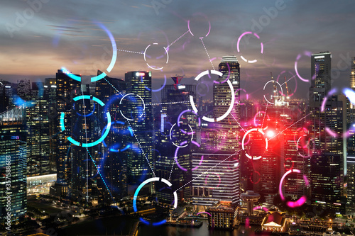 Hologram of abstract technology glowing icons, panoramic cityscape of Singapore at sunset, Asia. The concept of worlds technological changes. Double exposure.