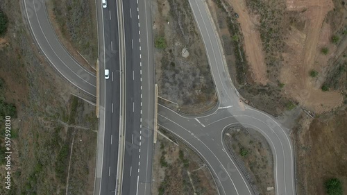 Aerial drone Top view of Highway road in Odeleite Dam reservoir - Algarve, Portugal photo