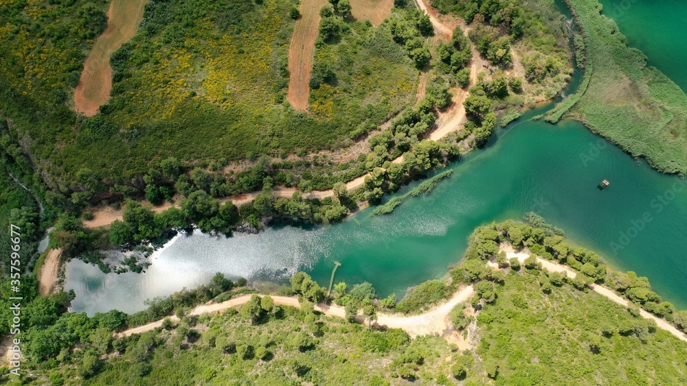 Aerial drone panoramic photo of beautiful nature in artificial lake and dam of Marathonas or Marathon that feeds drinking water supply to Athens, Attica, Greece Aerial drone panoramic photo of beautiful nature in artificial lake and dam of Marathonas or Marathon that feeds drinking water supply to Athens, Attica, Greece