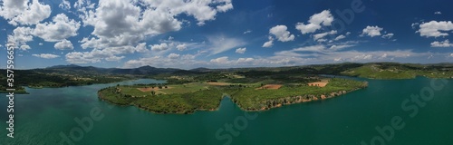 Aerial drone panoramic photo of beautiful nature in artificial lake and dam of Marathonas or Marathon that feeds drinking water supply to Athens, Attica, Greece © aerial-drone