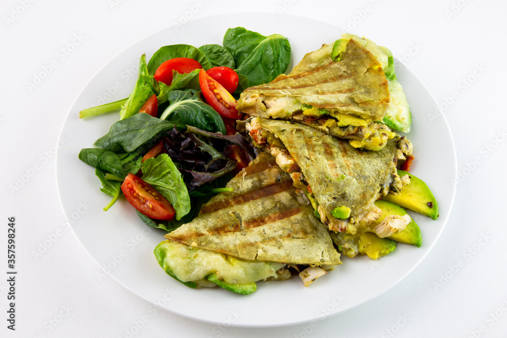 Chicken Quesadilla with avocado, dried tomatoes and jalapeno Chicken Quesadilla with avocado, dried tomatoes and jalapeno