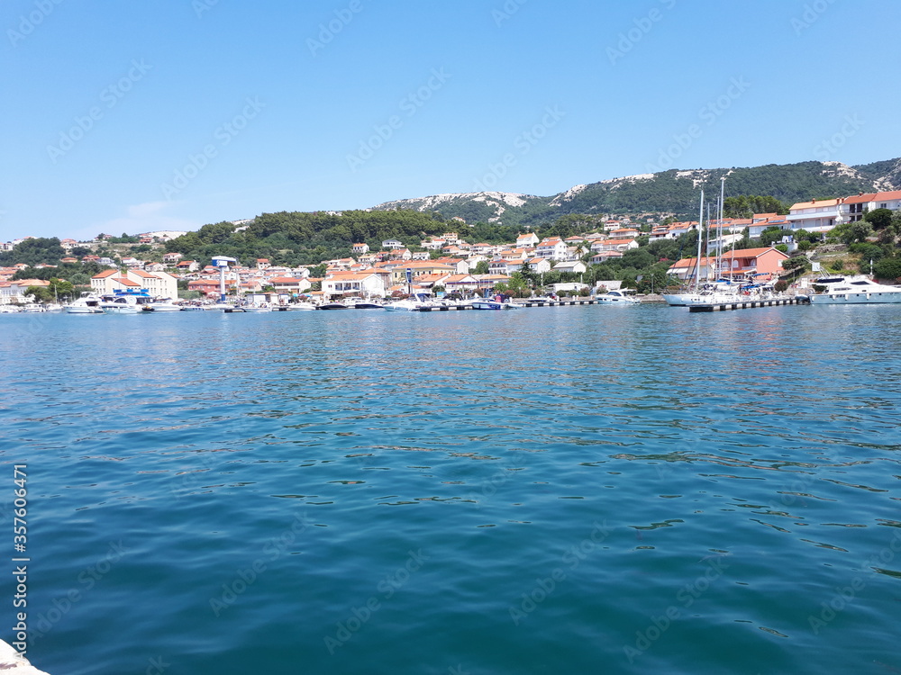 view  from the sea of the bay of Rab in Croatia