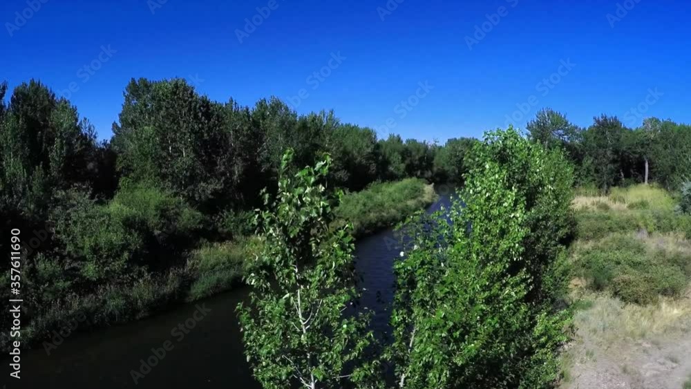 Aerial river follow and reveal Aerial river follow and reveal