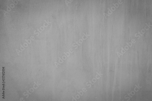 Texture of gray concrete wall surface. Some crack and scratch, suitable for use as a pattern or background image.