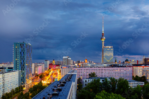 Berlin sunset cityscape aerial view with tv tower in heavy storm conditions © Rico Oder