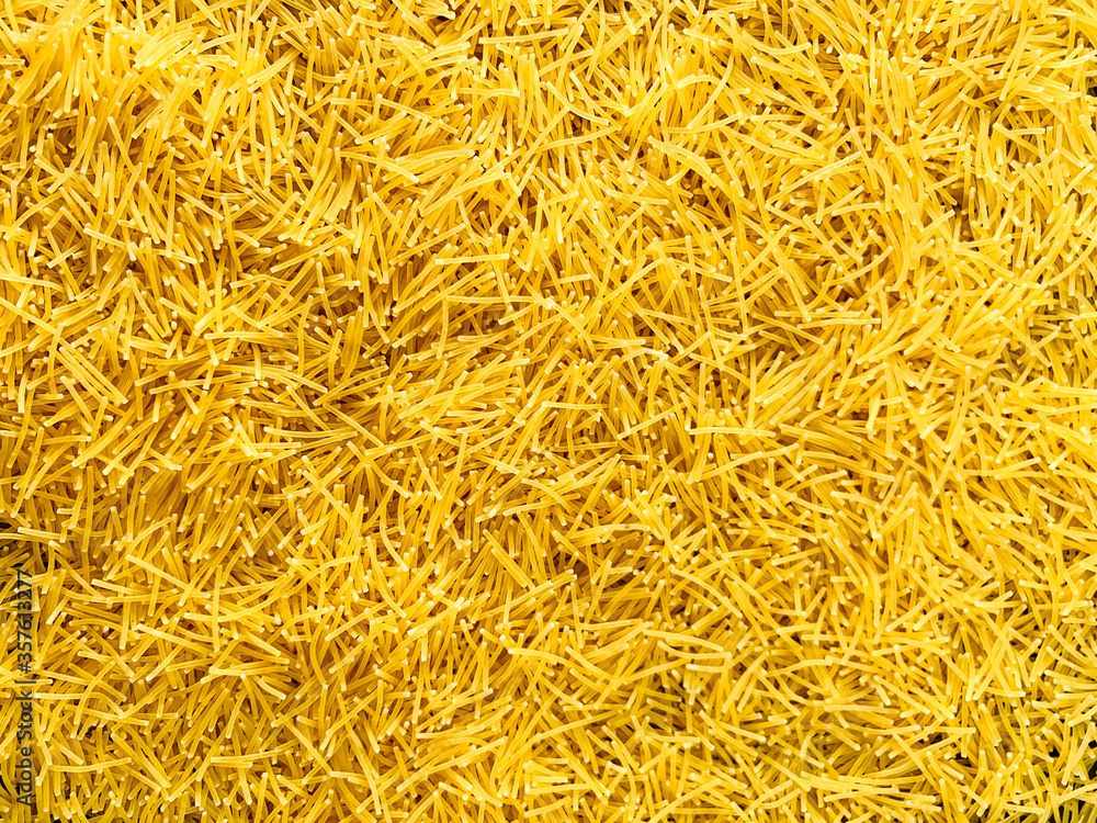 Raw vermicelli pasta texture background Raw vermicelli pasta texture background