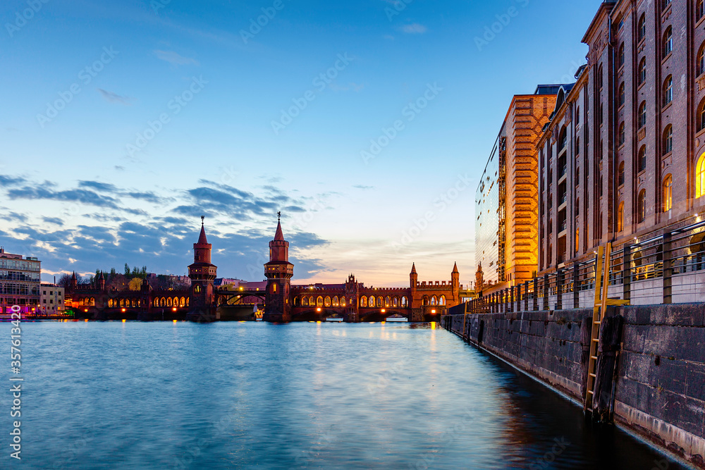 Berlin night cityscape view with oberbaumbridge and spree river