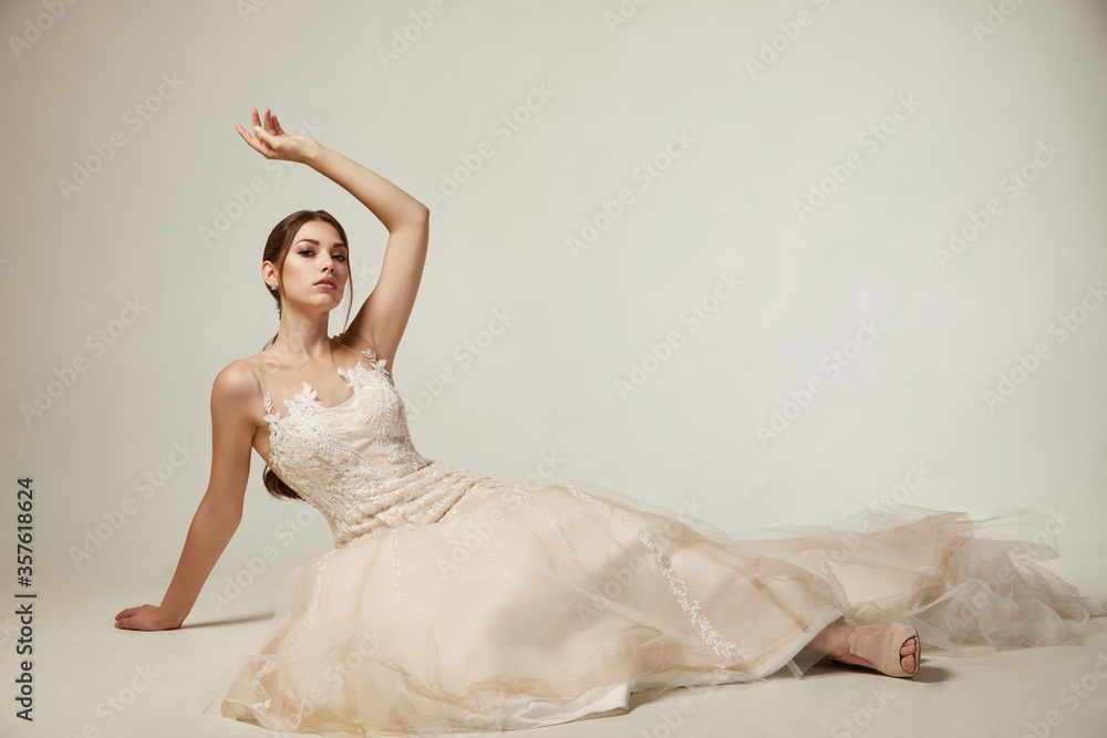 girl sitting in an elegant dress girl sitting in an elegant dress