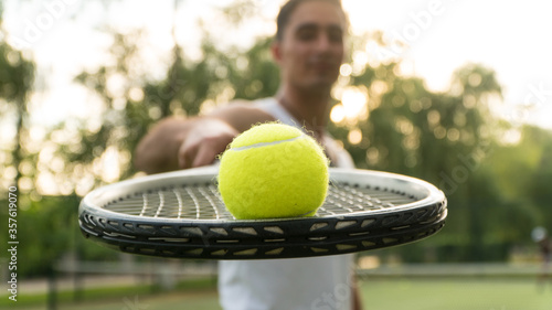  man on the tennis court with racket and ball © Ирина Бельдий