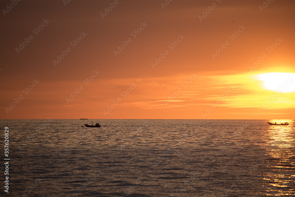 boat in sea with sunset boat in sea with sunset