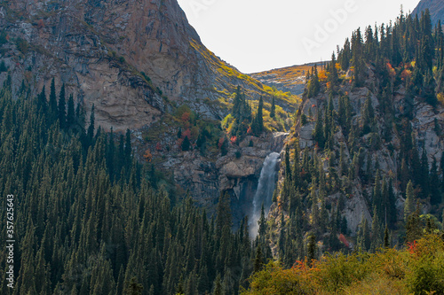 The tears of the leopard waterfall in Barskoon valley in Kyrgyzstan in the autumn colors. photo