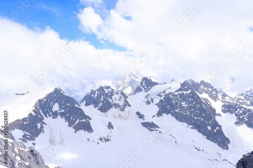 The Alps mountain from the Titlis Peak in bright summer season in Engelberg, Switzerland