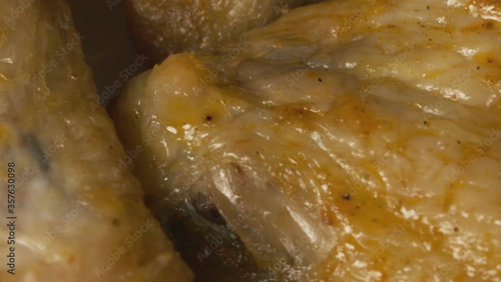 Meat grocery video background close-up shot chicken wings grill macro slow rotation in front of the camera Meat grocery video background close-up shot chicken wings grill macro slow rotation in front of the camera