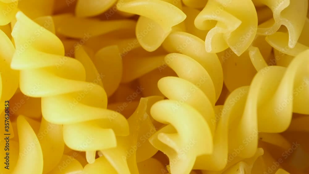Grocery video background top-quality wheat flour pasta close-up rotates in front of the camera macro shooting Grocery video background top-quality wheat flour pasta close-up rotates in front of the camera macro shooting