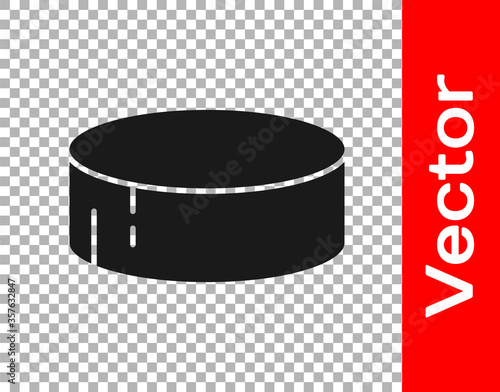 Black Hockey puck icon isolated on transparent background. Sport equipment. Vector Illustration.