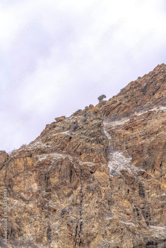 Rocky mountain terrain with steep and rugged slope in Provo Canyon Utah