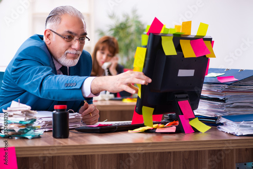 Two employees and excessive work in the office