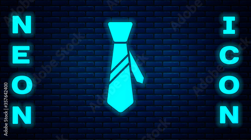 Glowing neon Tie icon isolated on brick wall background. Necktie and neckcloth symbol. Vector Illustration.