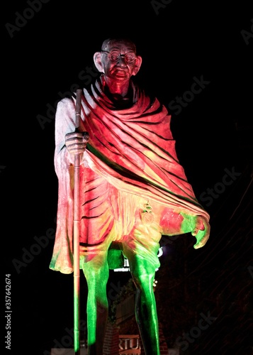 statue of mahatma Gandhi holding his stick  