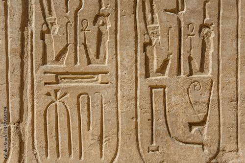 Egyptian ancient hieroglyphs on the stone wall