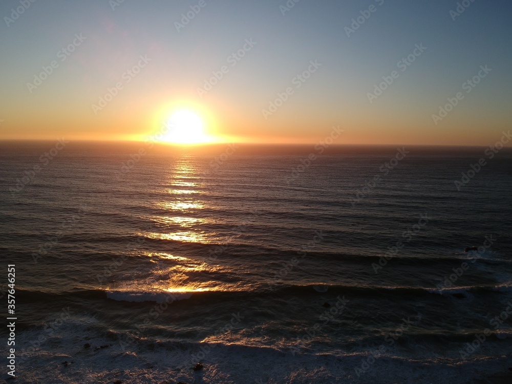 Sunset over Pacific Coast Highway, Pacific ocean, USA Sunset over Pacific Coast Highway, Pacific ocean, USA