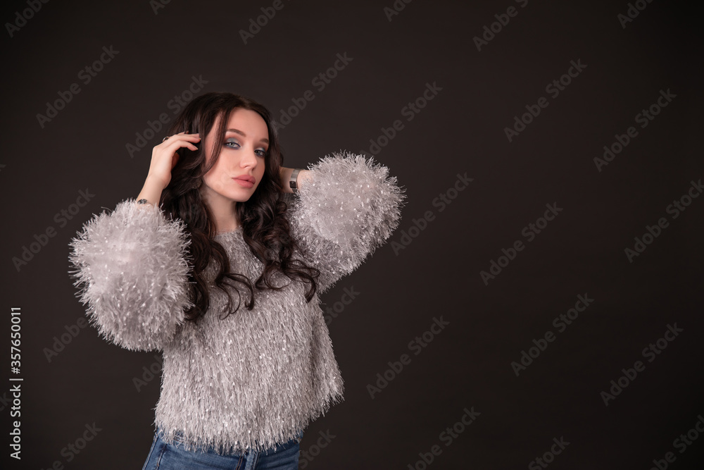 Beautiful girl on a black background. copy space. Beautiful girl on a black background. copy space.