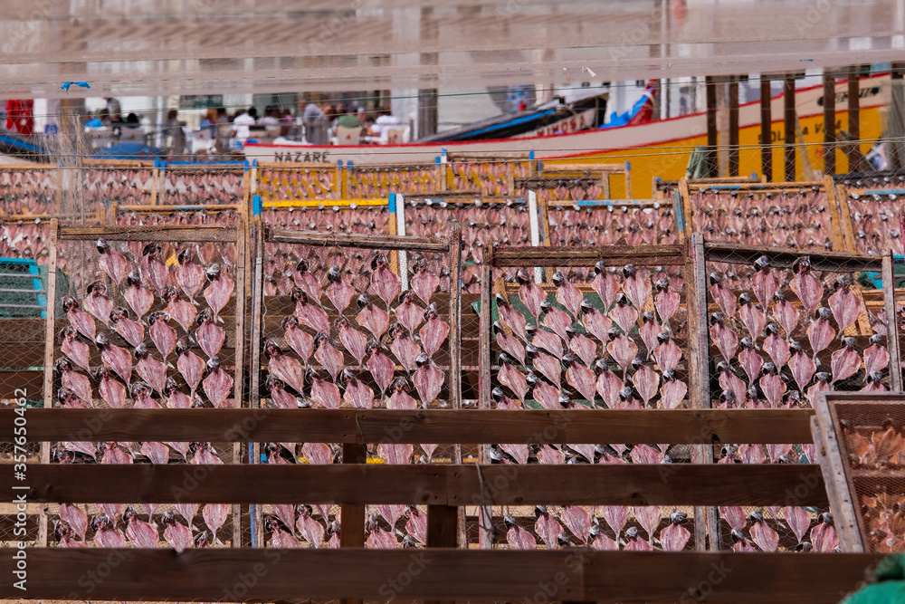 Traditional Wooden Racks with Dry Fish in the Sun at the Beach Nazaré