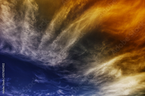 Abstract colorful sky with wispy clouds