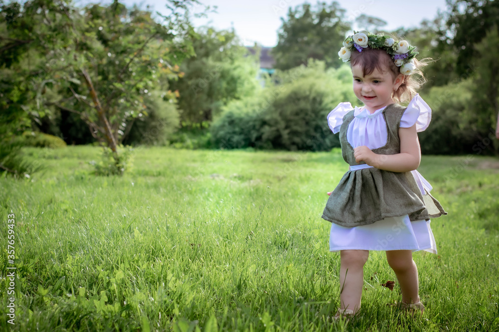 little dark-haired girl in the garden plays with chickens
little dark-haired girl in the garden plays with chickens