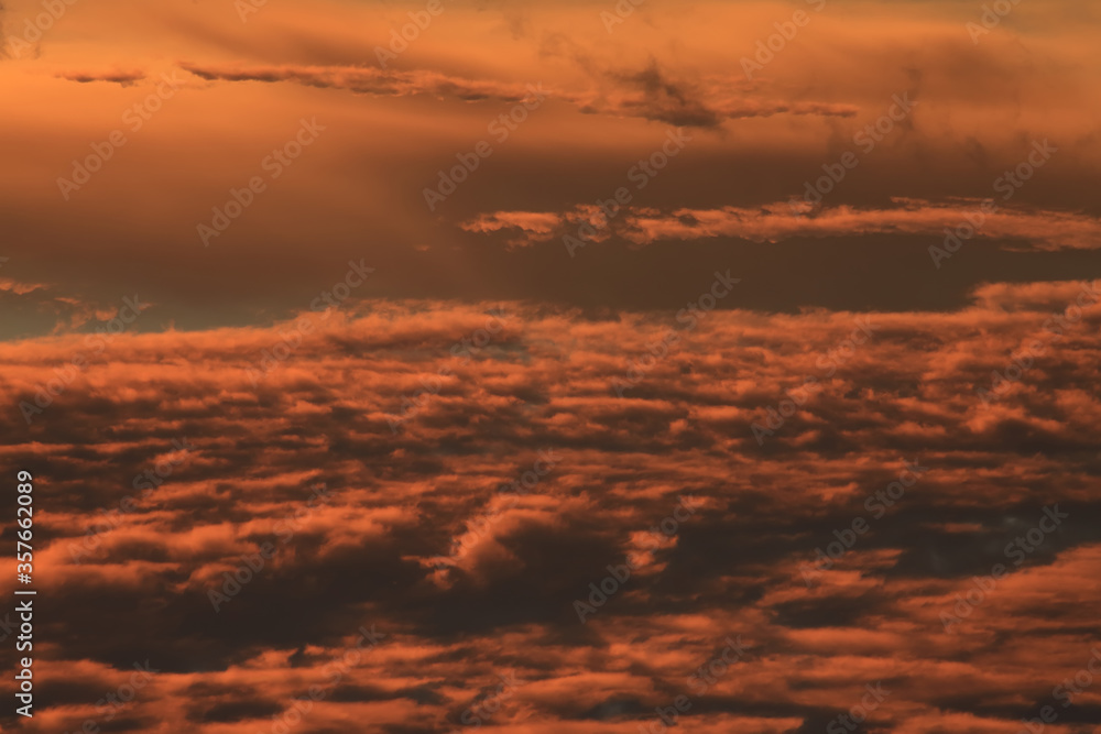 view of sunset clouds from above