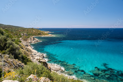 Turquoise sea and rugged coast of Corsica © Jon Ingall