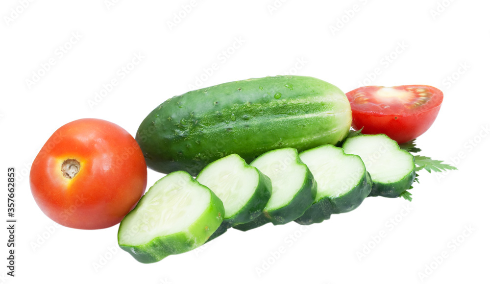 green cucumbers and tomato isolated on white background green cucumbers and tomato isolated on white background
