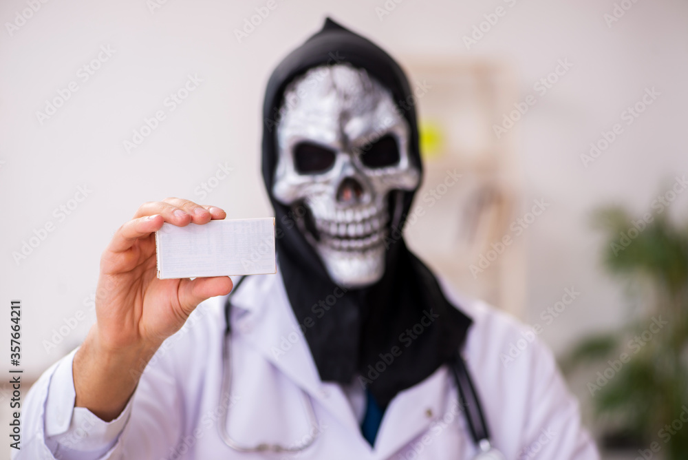 Male devil doctor working in the clinic Male devil doctor working in the clinic