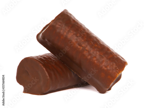 Chocolate cake roll isolated on white