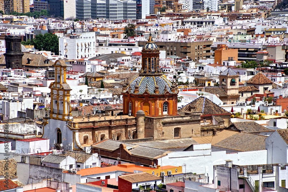 Fototapeta premium City View from Giralda Spire Bell Tower in Seville Cathedral in Andalusia Spain.