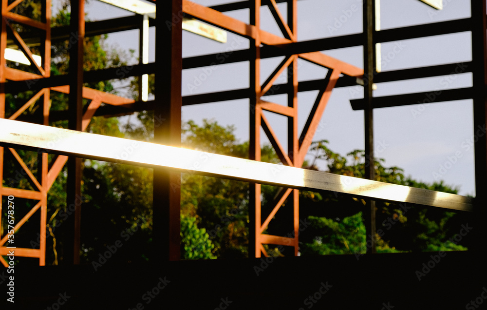 Obraz premium construction in the jungle at sunset