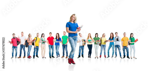 Large group of teenage students isolated on white background. Many different people standing together. School, education, college, university.