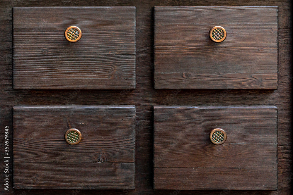 old wooden box or organizer for storing jewelry, small items. Wooden storage and interior decoration in past centuries old wooden box or organizer for storing jewelry, small items. Wooden storage and interior decoration in past centuries