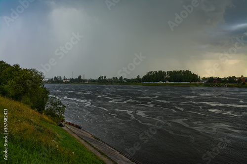 Summer day with rain and rainbow on the banks of the Neva in St. Petersburg.
