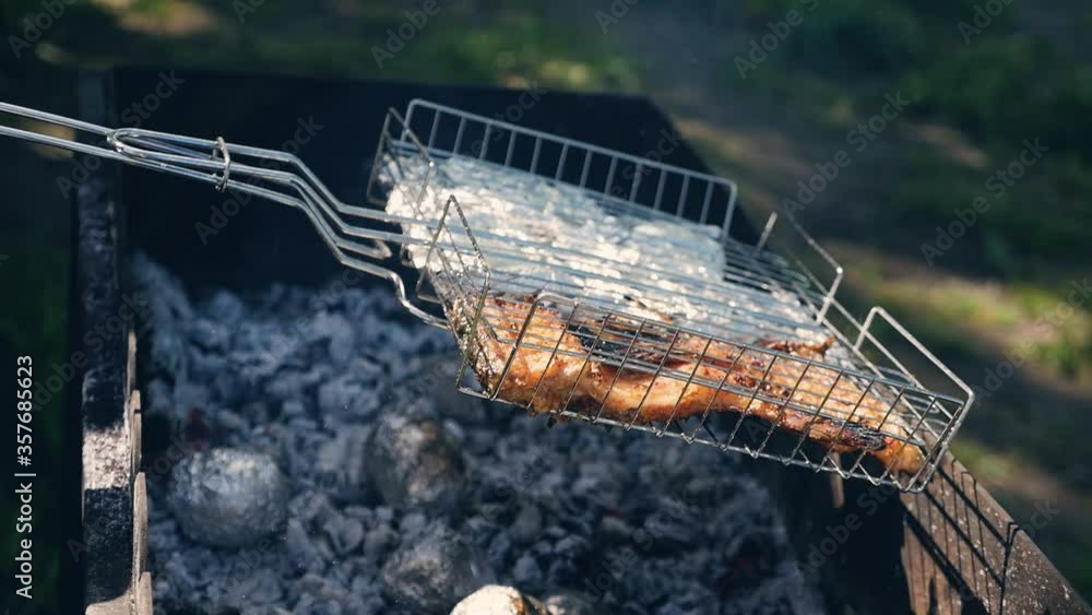 custom made wallpaper toronto digitalGrilled fish foil in open foil. Delicious fish steak. Cooking on bbq grill. Close up grilling fillet with black pepper on charcoal grill. Preparing fish bbq at picnic outdoor. Smoke.