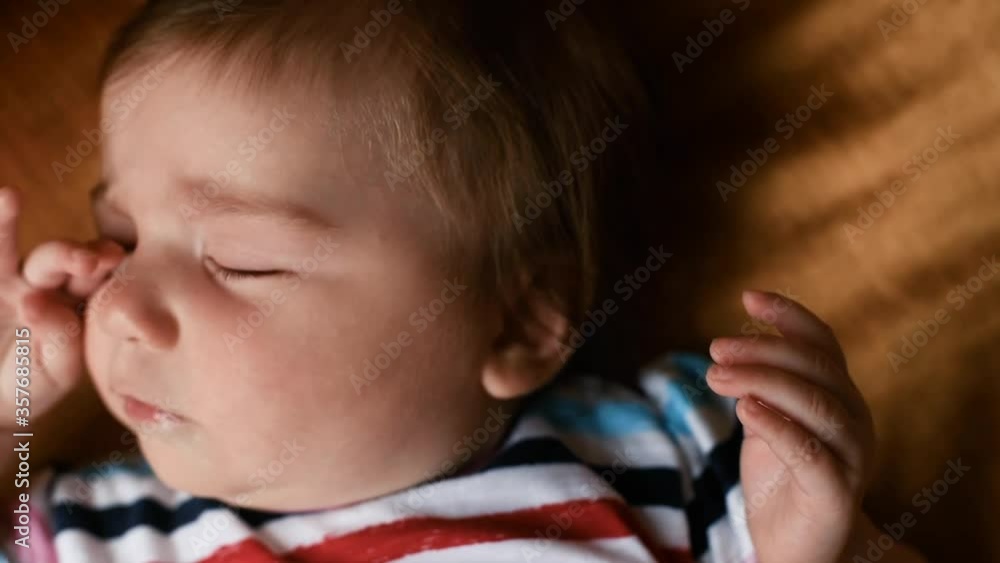Baby teething and blowing bubbles