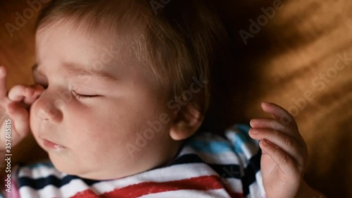 Baby teething and blowing bubbles
