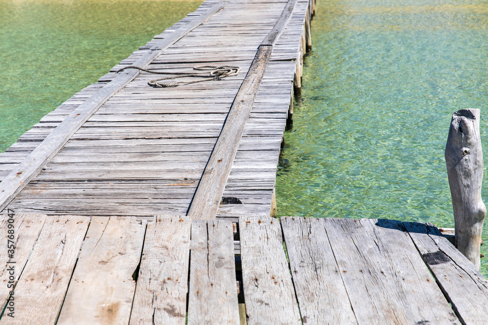 old wooden pier, lazy beach, koh rong samloem island, Sihanoukville, Cambodia. old wooden pier, lazy beach, koh rong samloem island, Sihanoukville, Cambodia.
