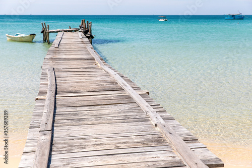 old wooden pier, lazy beach, koh rong samloem island, Sihanoukville, Cambodia. © MuratTegmen