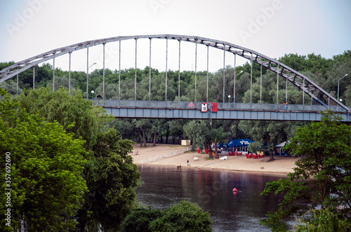 pedestrian bridge over the river © Алексей Ковалев