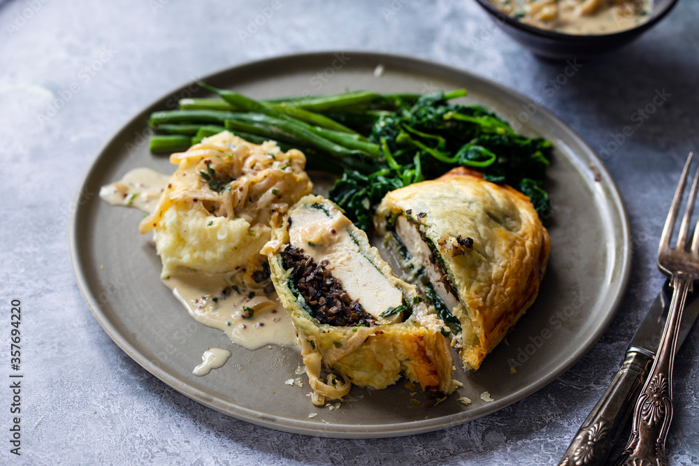 Chicken Wellington with creamy mustard sauce, spinach and green beans Chicken Wellington with creamy mustard sauce, spinach and green beans