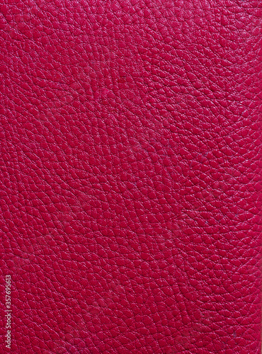 Red Leather Background. Red leather texture closeup background. Structured background design leather. A place for text or a logo. Beauty and Fashion. Red leather jacket.