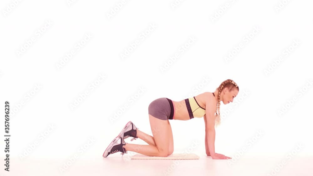 Trainer fitness girl doing donkey kick side view. Sports video tutorials isolated on white. Health care concept. Sports concept. tinted footage. Prores 422. Trainer fitness girl doing donkey kick side view. Sports video tutorials isolated on white. Health care concept. Sports concept. tinted footage. Prores 422.