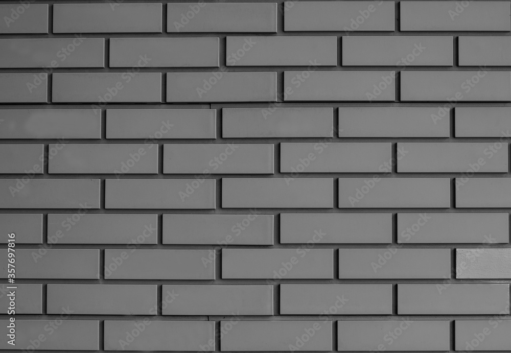 Fototapeta premium textured brick wall. White and orange masonry bricks.